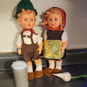 Vintage German Hansel and Gretel Goebel Hummel dolls with beer stein and veggies
